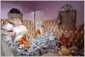 A look at workers in India who are paid extra to wear devices that capture first-person video of factory and other work tasks for use as AI robot training data (Saritha Rai/Bloomberg)