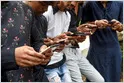India requires caller ID and call-management apps to share users' spam reports with telcos; Truecaller calls it a "one-way exchange" that is "anti-competitive" (Jagmeet Singh/TechCrunch)