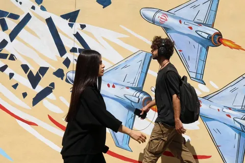 Iranians find community in art, culture and memes as missiles fly