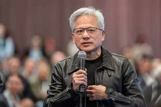 During a Salesforce event, Jensen Huang says the AI industry doesn't need any new laws or regulations and market forces will help companies safely innovate (Brody Ford/Bloomberg)