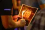 A Year After Iryna's Murder, Slam Shut Revolving Prison Door