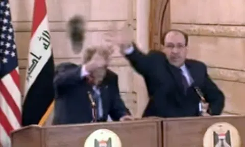 An Iraqi journalist threw his shoes at George W. Bush, kicking off a copycat era