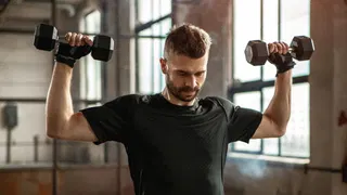  'Stop doing overhead presses until you fix these 3 huge mistakes,' says a personal trainer 