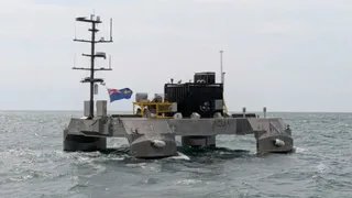  UK tests robot boat that can fly its own wired drone even in 14ft waves and stay at sea for weeks 