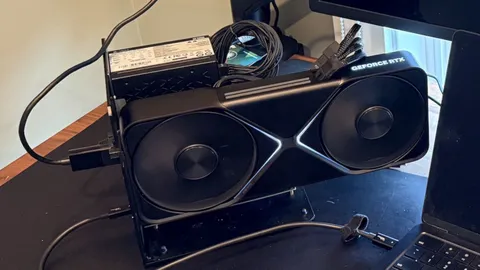 M5 Max MacBook Pro paired with RTX 5090 in an eGPU dock — runs Cyberpunk 2077 at over 100 FPS at max settings with frame generation