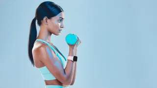  If you want to build strength while also working on your posture and alignment, try this Pilates-inspired dumbbell workout 
