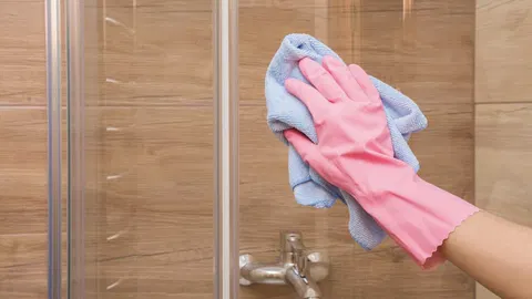  I removed stubborn water stains from my glass shower door — without using vinegar 