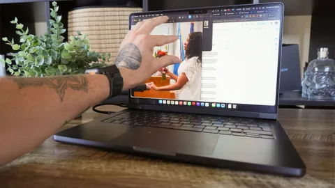 I'm bored of waiting for a touchscreen MacBook, so I made one myself with this snap-on Magic Screen