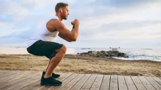  This personal trainer’s yoga block trick fixes tight ankles and stiff joints during squats 