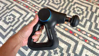  I thought massage guns were just for athletes until I threw my back out — this one was a lifesaver 