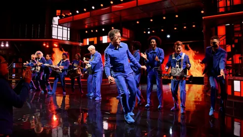 Stephen Colbert Joins David Byrne for Performance of “Burning Down the House”: Watch