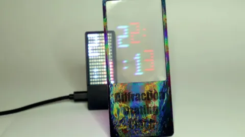 A Diffraction Grating Makes This Clock Readable