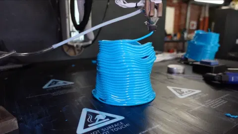 Continously Extruding 3D Printed Tubes with Compressed Air