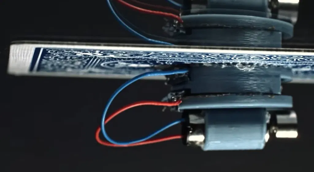 Using Vibration to Make Stuff Stick Contact-Free to Ceilings