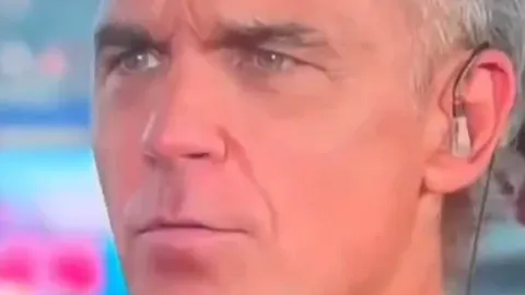 Robbie Williams addresses white substance incident during live World Cup interview and says his 'fake apology' has had 27 million views