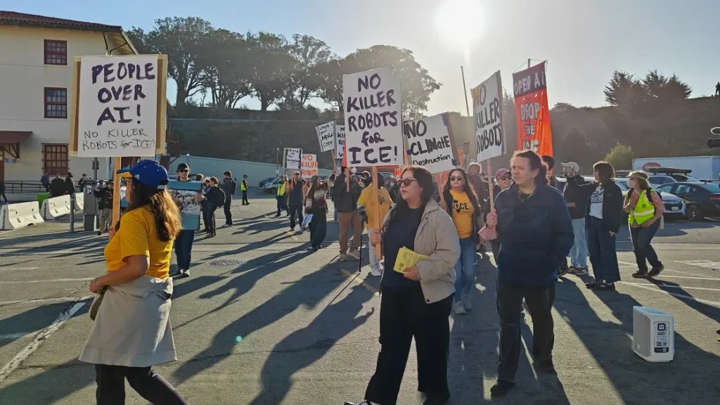 'People Over AI:' Dozens Protest Outside OpenAI's DevDay Conference