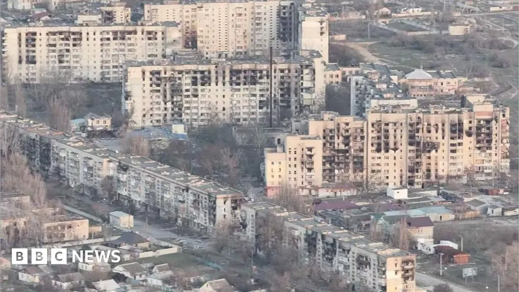 Risking their lives to find food and water in Russian-occupied city