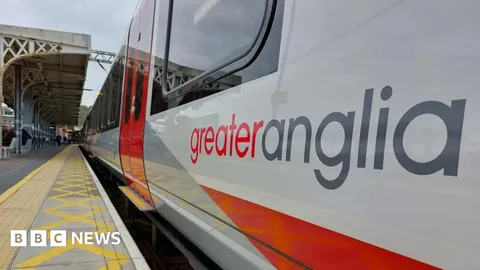 Trains in and out of London halted after trackside fire