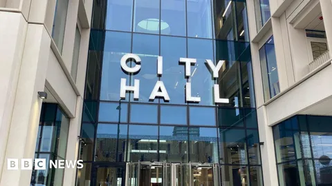 Councillor charged over Nigerian population comment
