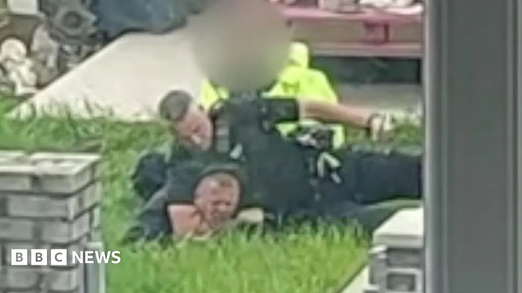 Police officer who put suspect in headlock and punched him 9 times faces misconduct hearing