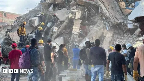 Rescuers scramble for survivors with 180 dead in Colombia earthquake