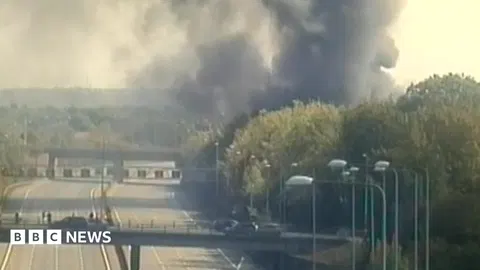 Smoke from warehouse fire closes section of M25