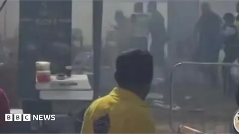 Three in hospital after fire and crush at festival in London