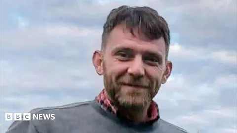 Man found dead with murdered wife had been accused of attacking her