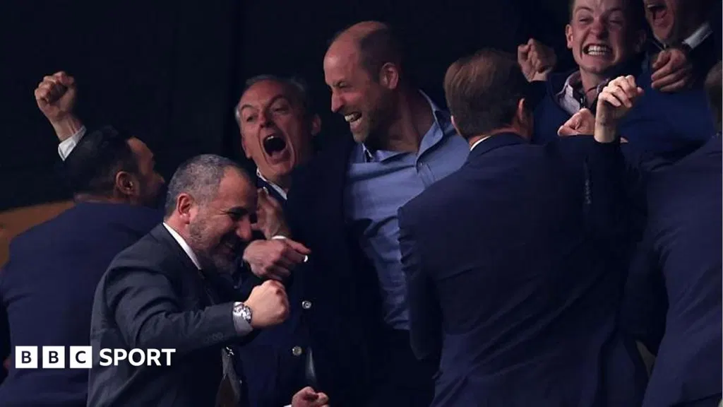 Prince William shares beer with Villa players after win