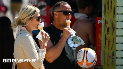 Summer warmth to return this week but rain will linger for some