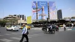 Israel carries out air strikes on Lebanon, state media says, as Iran claims deal with US near