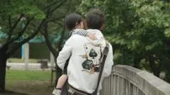 In Japan, divorce splits parents from children. Could a law change end sole custody?