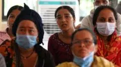Nepal death toll nears 1,000 as rescuers race to find workers trapped in mud-filled tunnels