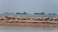 US lifts naval blockade as Iran's supreme leader says Trump made deal 'out of desperation'