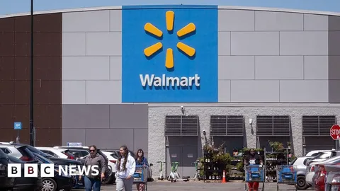 Walmart warns US shoppers are cutting spending as higher gas prices bite
