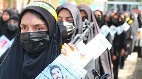 Iran parades armed women in streets as questions over AI videos grow