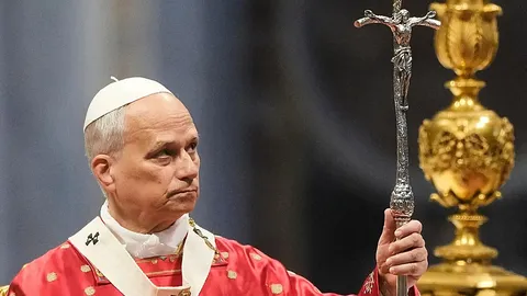 Pope prays humanity be saved from 'evil of war' as Catholic faithful mark Pentecost