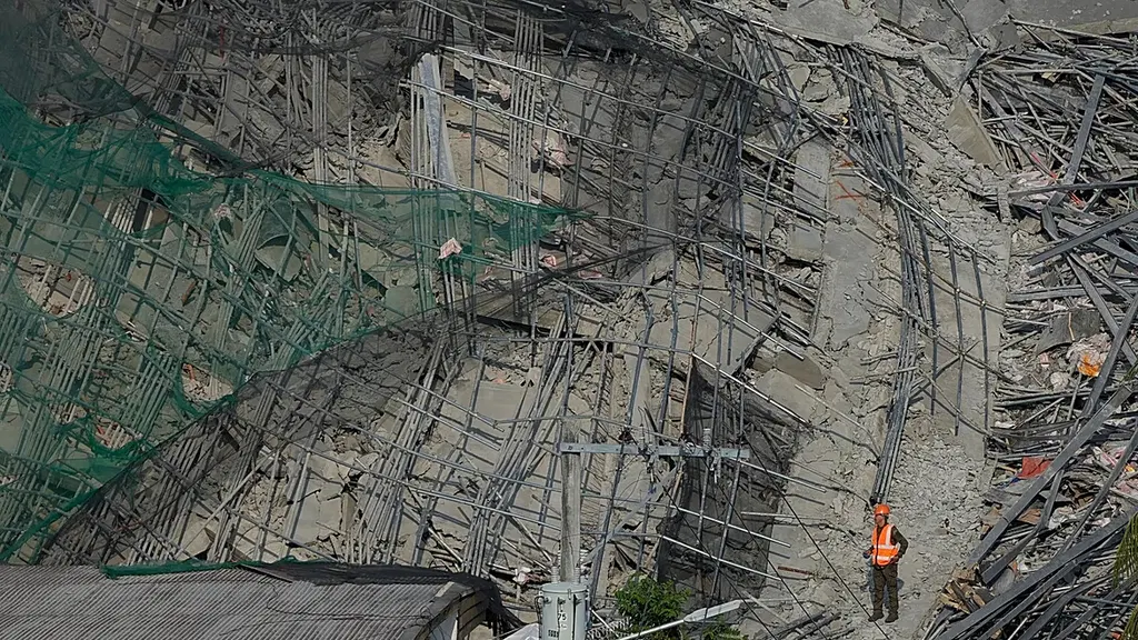 At least four dead, 17 still missing after collapse of unfinished hotel in Philippines