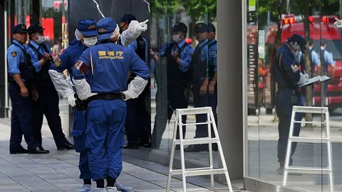 Panic at Tokyo luxury mall after man sprays unidentified substance