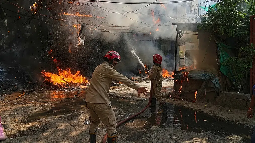 At least 21 people, mostly foreign nationals, killed in New Delhi hotel fire, police say