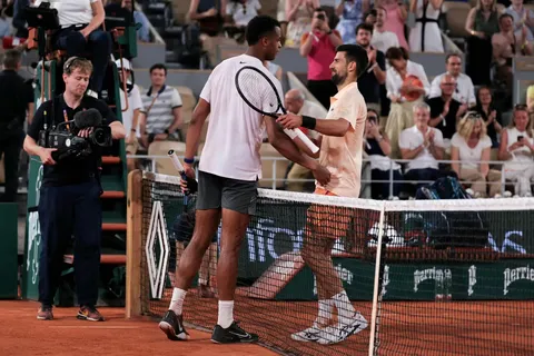 Djokovic fights through tough Roland Garros opener