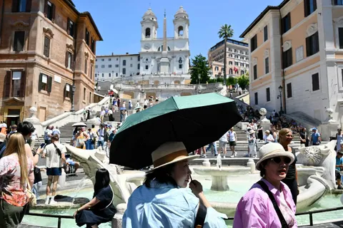 Europe's heatwave in pictures, from Milan's Duomo to the crowded beaches of southern England