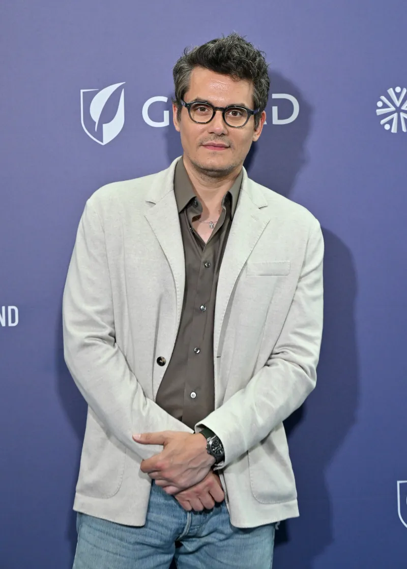 John Mayer Channeled Young Eric Clapton in a Breezy Summer Blazer