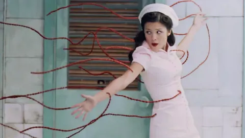 Watch Olivia Rodrigo Unravel in New “The Cure” Video
