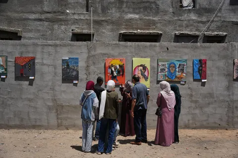 Young Palestinian artists in Gaza exhibit their impressions of war as fragile ceasefire holds