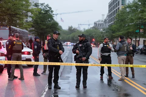 Suspect 'down' after shooting at officers near White House, official says