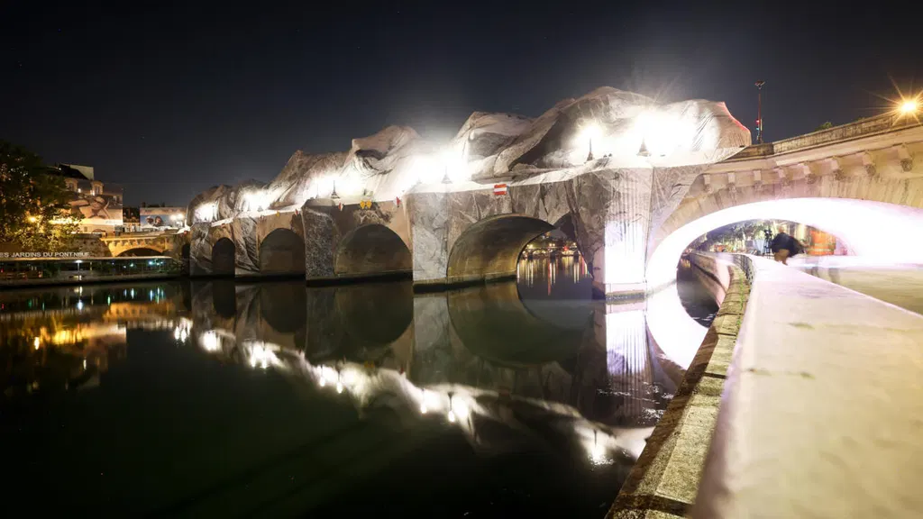 ‘French Banksy’ JR starts wrapping Paris’s Pont Neuf bridge in inflatable ‘cave’