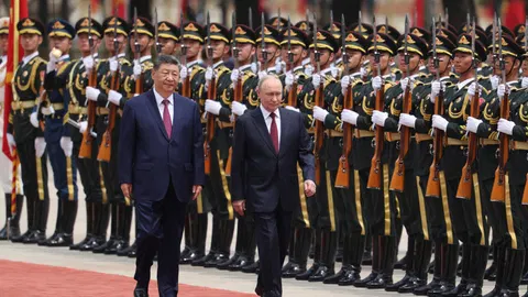 Xi welcomes Putin in Beijing, hails China’s ‘unyielding’ ties with Russia