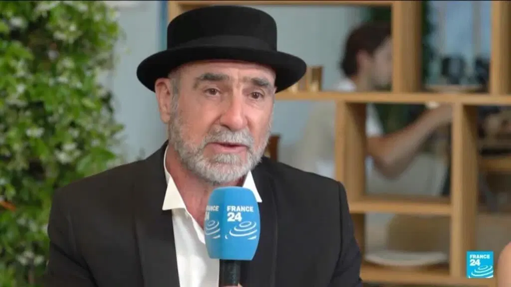 Former football star Eric Cantona makes double appearance in Cannes