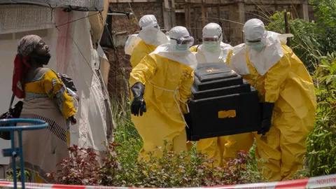 The week in pictures: Ebola outbreak in Africa, Putin in China and Cannes Film Festival mermaids